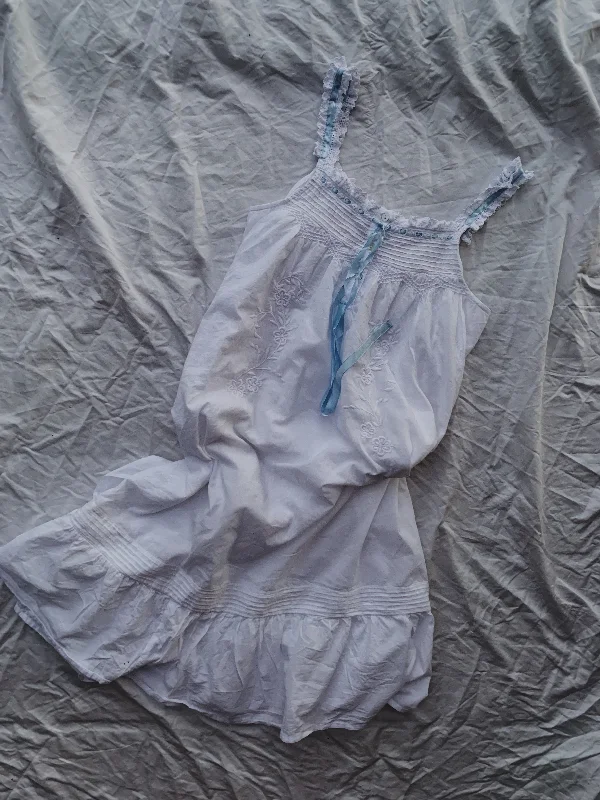 Save More When You Shop More!Save More When You Shop More!2 LEFT - 100% RECYCLED COTTON - NIGHTINGALE HAND SMOCKED DRESS WHITE Save More When You Shop More!Save More When You Shop More!2 LEFT - 100% RECYCLED COTTON - NIGHTINGALE HAND SMOCKED DRESS WHITE